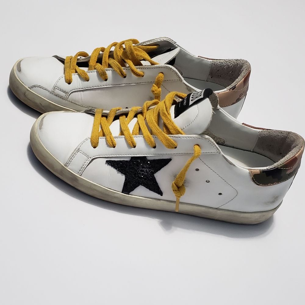 Golden Goose White Sneakers with Black and Yellow Accents
